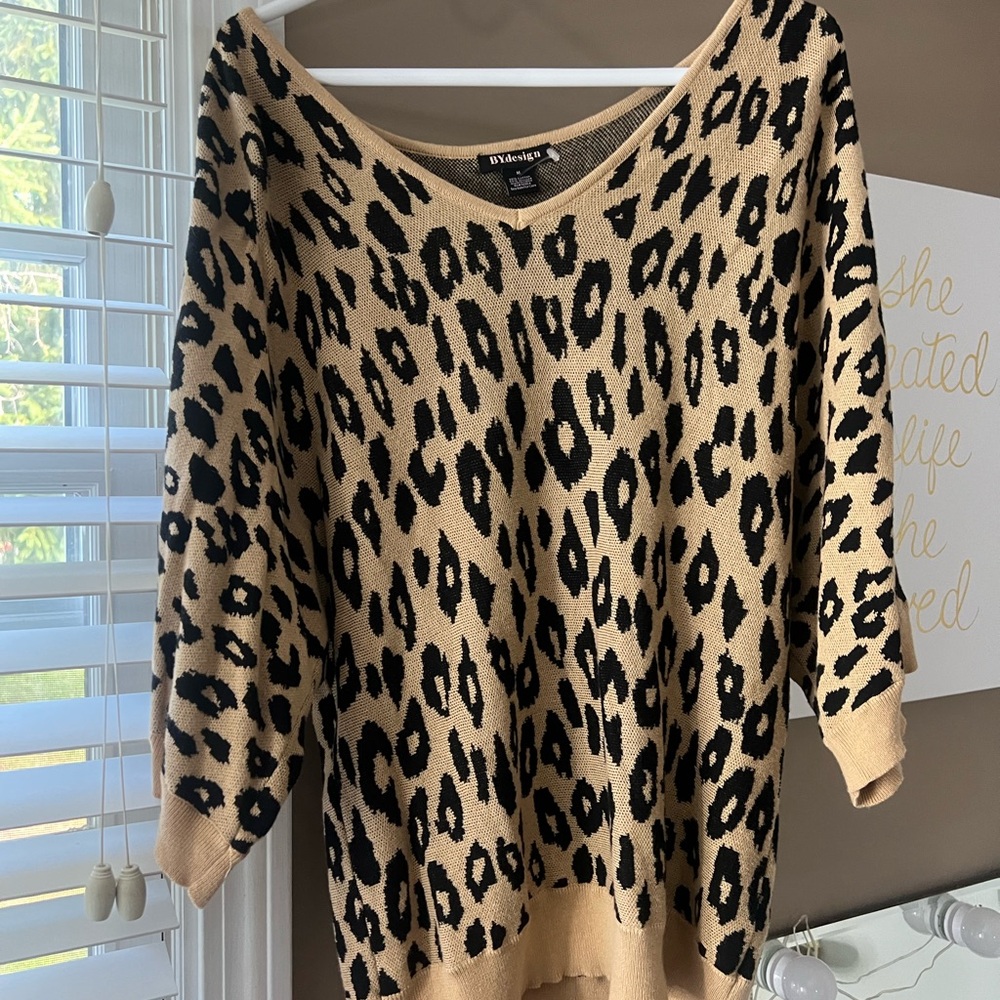 Three quarter sleeve size medium cheetah shirt